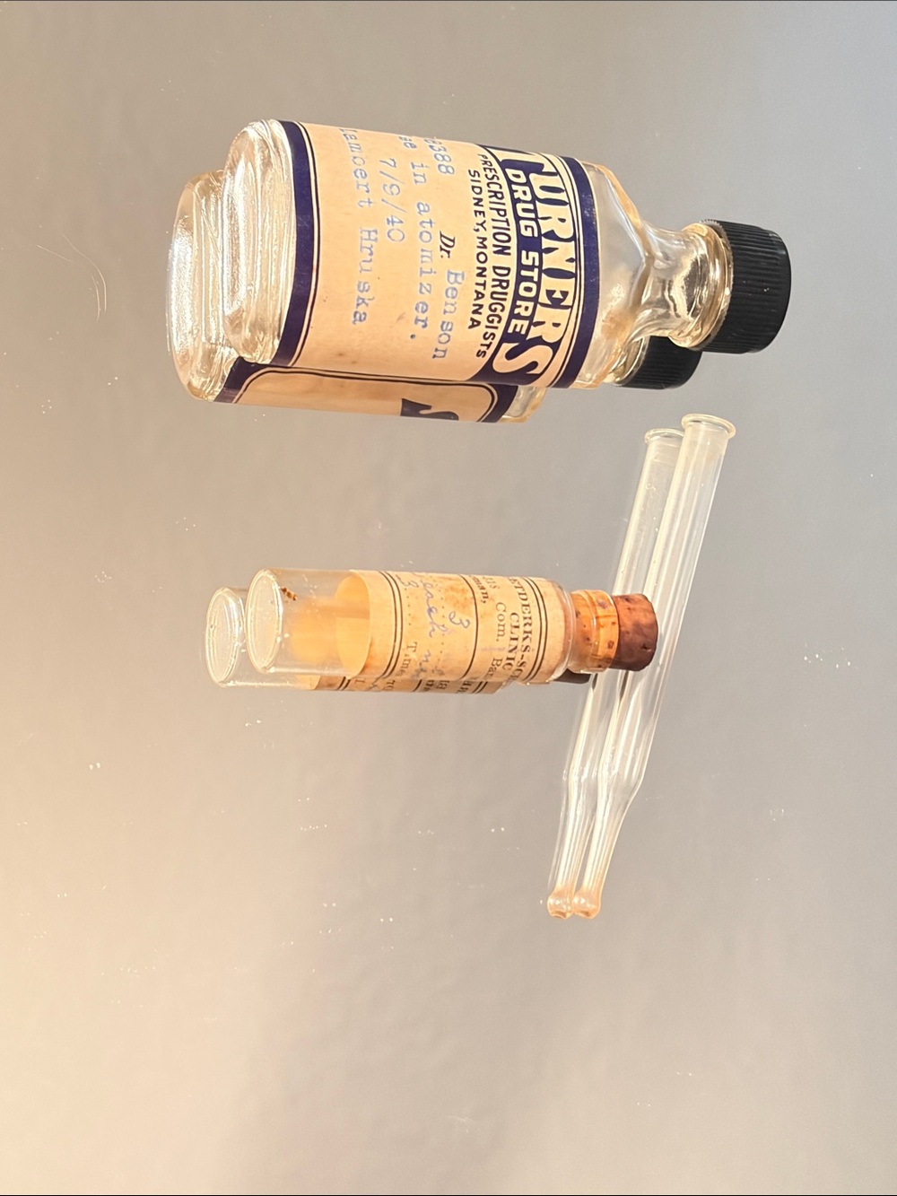 Vintage glass medicine bottles from 1940